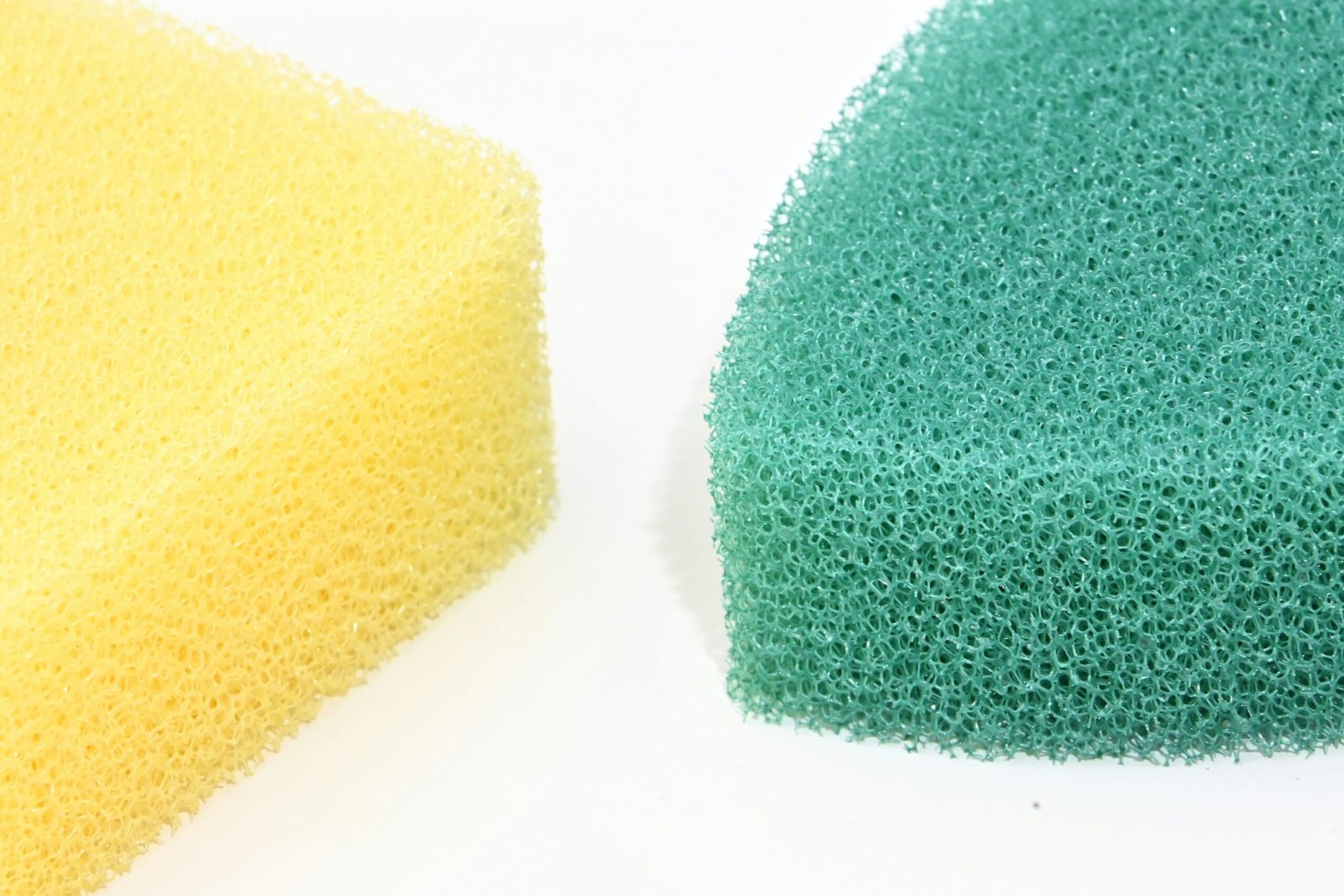 A sponge and a sponge on a white surface